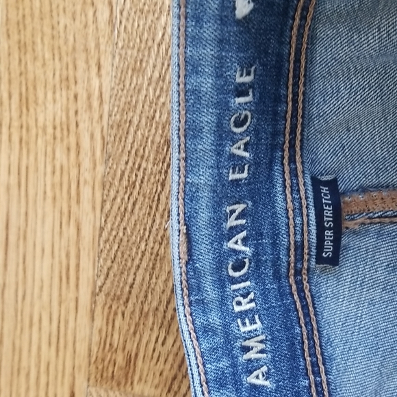 (4) American Eagle Light Wash Kick Boot Super Stretch Extra Short Jeans - Picture 4 of 11